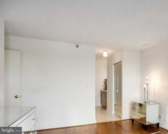 900 Stafford St N Unit 2222, Arlington, VA 22203 - spare room featuring light wood finished floors and baseboards
