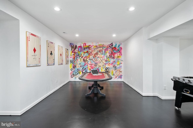 playroom with recessed lighting and baseboards