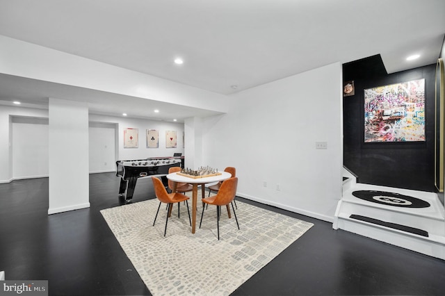 dining space featuring recessed lighting and baseboards