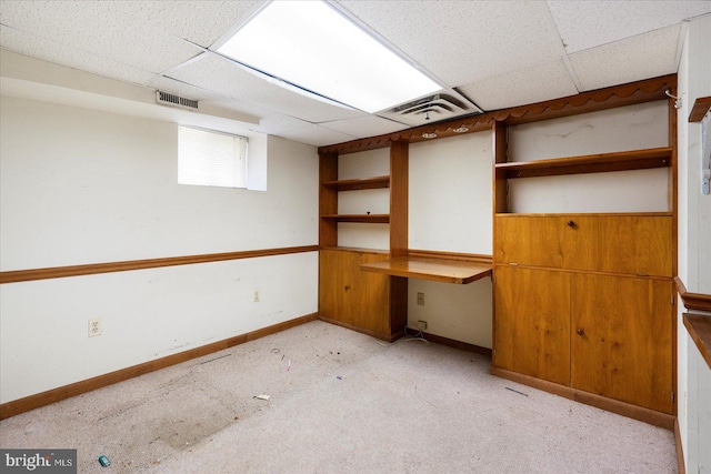 2611 Elsinore Ave, Baltimore, MD 21216 - basement featuring visible vents, baseboards, and a drop ceiling