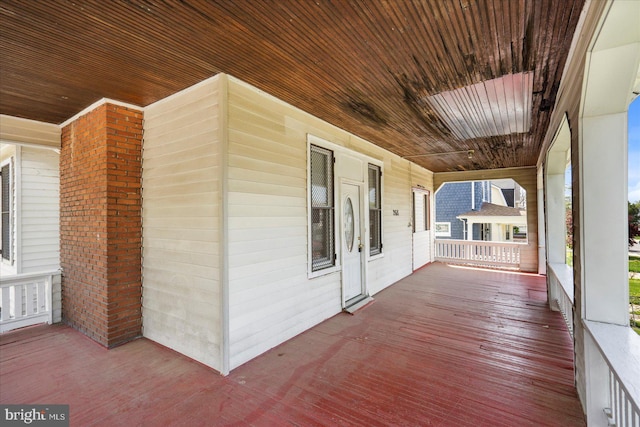 wooden deck featuring a porch
