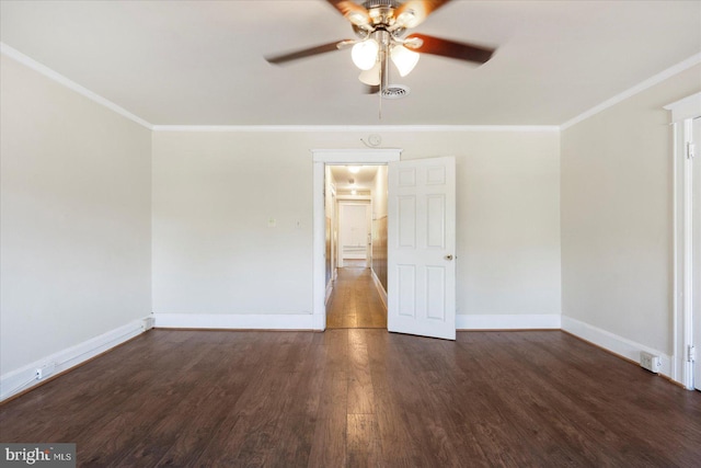 unfurnished room with crown molding, a ceiling fan, baseboards, and wood finished floors