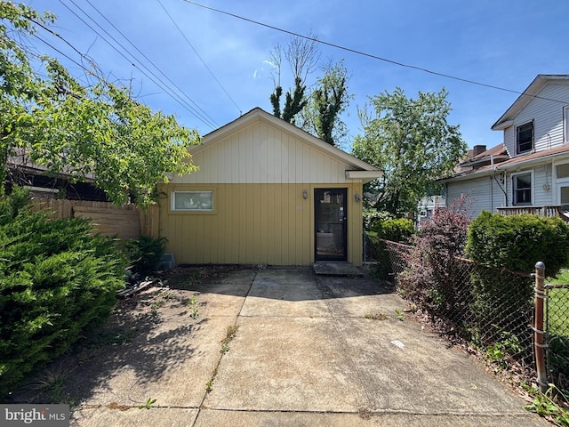 view of front of house with fence