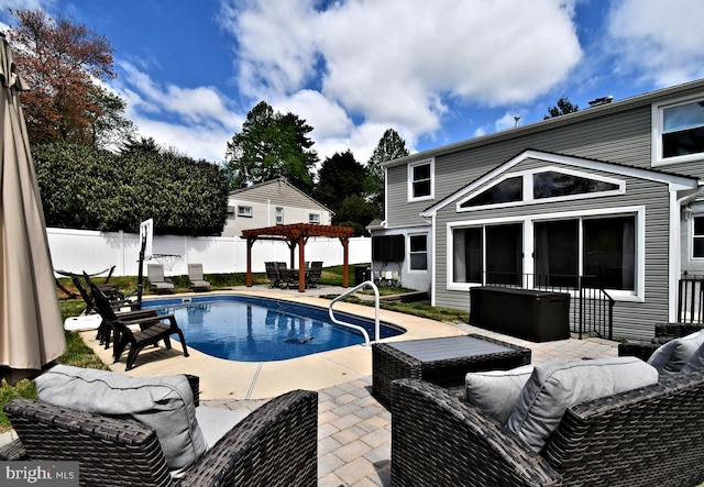 view of swimming pool featuring fence, a pergola, a patio, and a fenced in pool