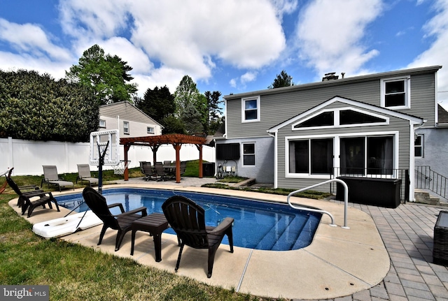 view of swimming pool with a patio, fence, a fenced in pool, and a pergola