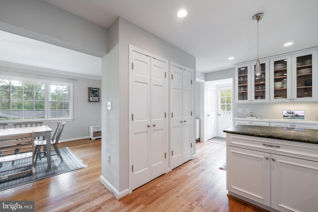 403 Thomas St, Alexandria, VA 22302 - kitchen featuring baseboards, recessed lighting, a wealth of natural light, and light wood-type flooring