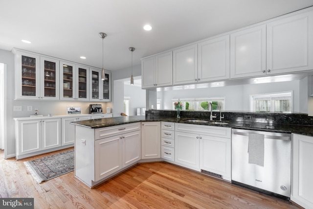 403 Thomas St, Alexandria, VA 22302 - kitchen with stainless steel dishwasher, recessed lighting, light wood-type flooring, white cabinets, and a sink