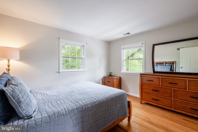 403 Thomas St, Alexandria, VA 22302 - bedroom with baseboards, light wood-type flooring, and visible vents
