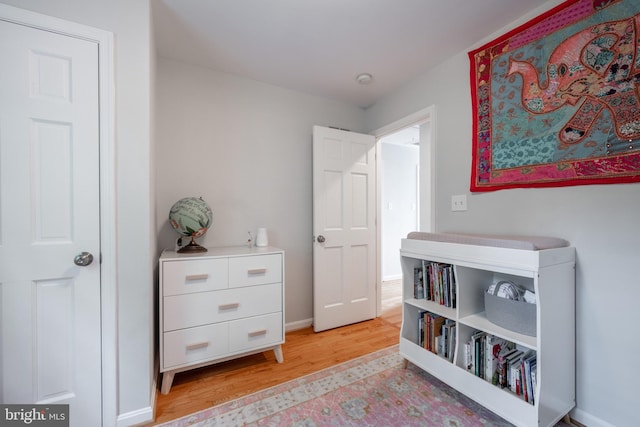 403 Thomas St, Alexandria, VA 22302 - bedroom with baseboards and light wood-style flooring