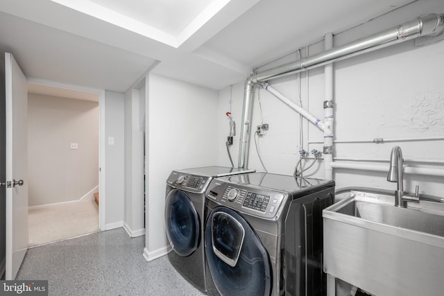 403 Thomas St, Alexandria, VA 22302 - clothes washing area with a sink, baseboards, and independent washer and dryer