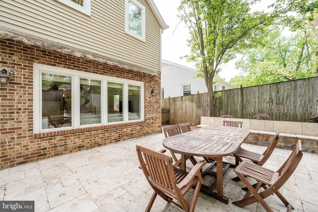 403 Thomas St, Alexandria, VA 22302 - view of patio / terrace with a fenced backyard and outdoor dining area
