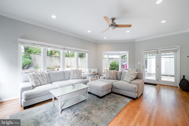 403 Thomas St, Alexandria, VA 22302 - living room featuring recessed lighting, wood finished floors, and a healthy amount of sunlight