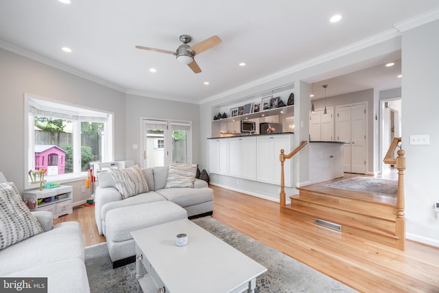 403 Thomas St, Alexandria, VA 22302 - living area with recessed lighting, ornamental molding, a ceiling fan, and light wood-type flooring