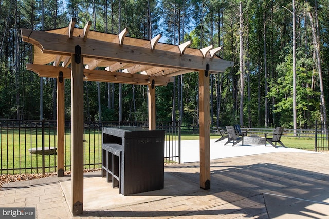 view of property's community with a fire pit