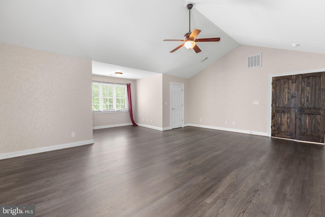 unfurnished living room with a ceiling fan, vaulted ceiling, dark wood-style floors, and baseboards