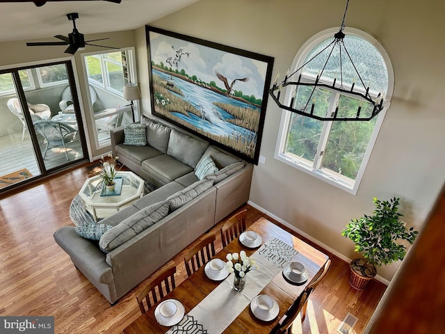 1105 N Bay Shore Dr, Milton, DE 19968 - living area featuring baseboards, wood finished floors, and ceiling fan