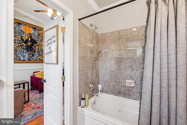 bathroom featuring ornamental molding, ceiling fan, and shower / tub combo