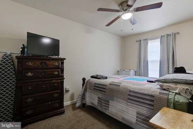 bedroom featuring carpet floors, a ceiling fan, and baseboards