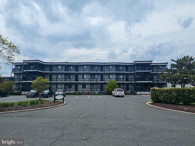 119 Old Landing Rd Unit 205A, Ocean City, MD 21842 - view of building exterior featuring uncovered parking