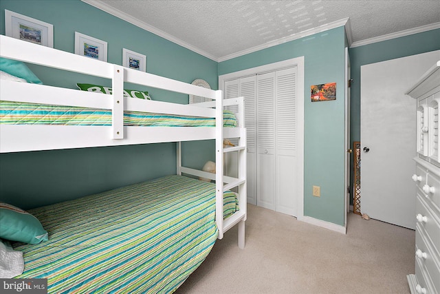119 Old Landing Rd Unit 205A, Ocean City, MD 21842 - bedroom featuring carpet, a closet, crown molding, a textured ceiling, and baseboards