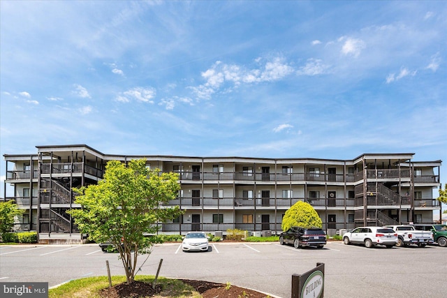 119 Old Landing Rd Unit 205A, Ocean City, MD 21842 - view of apartment building / complex with uncovered parking