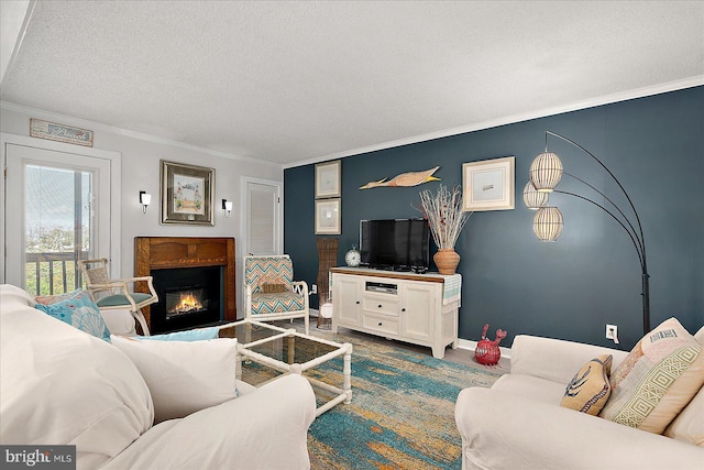 119 Old Landing Rd Unit 205A, Ocean City, MD 21842 - living area featuring baseboards, a lit fireplace, crown molding, and a textured ceiling