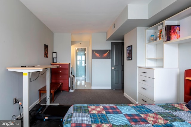 carpeted bedroom with baseboards and visible vents