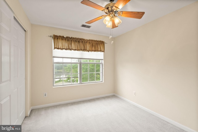 8075 Lacy Dr Unit 303, Manassas, VA 20109 - carpeted spare room featuring visible vents, baseboards, and a ceiling fan
