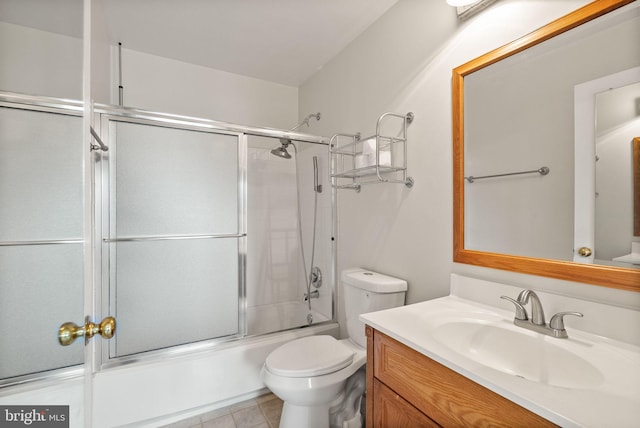 8075 Lacy Dr Unit 303, Manassas, VA 20109 - full bath with vanity, toilet, tile patterned floors, and enclosed tub / shower combo