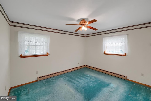spare room featuring ceiling fan, crown molding, baseboard heating, baseboards, and carpet floors