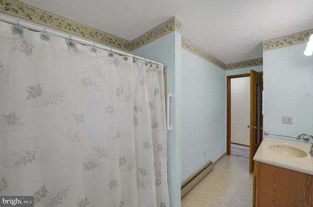 full bath featuring baseboard heating, curtained shower, tile patterned floors, baseboards, and vanity