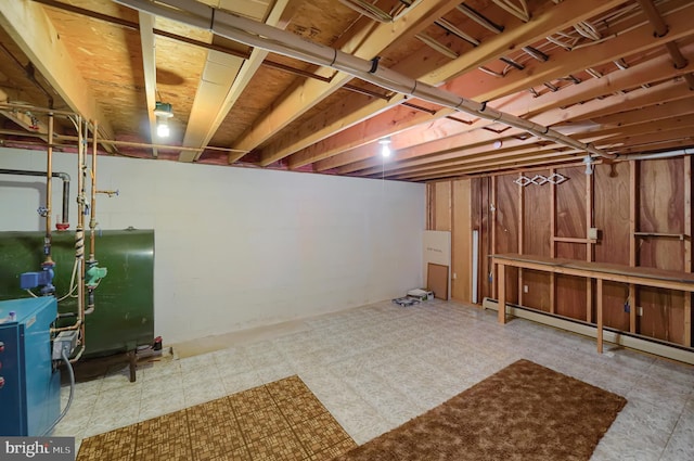 unfinished below grade area featuring tile patterned floors