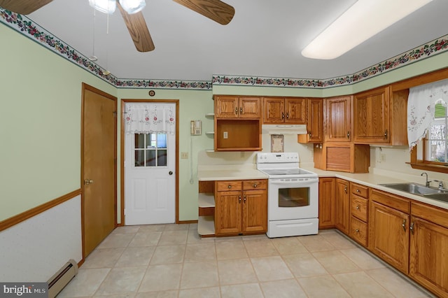 kitchen with brown cabinets, white range with electric stovetop, a sink, under cabinet range hood, and a baseboard heating unit