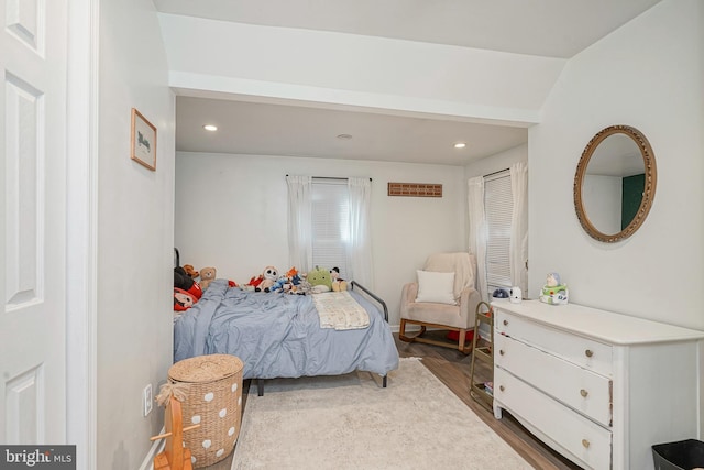 bedroom featuring recessed lighting and dark wood finished floors