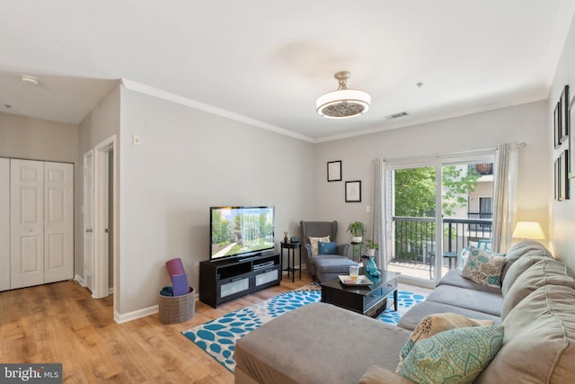 13347 Connor Dr Unit H, Centreville, VA 20120 - living room with light wood finished floors, crown molding, and baseboards