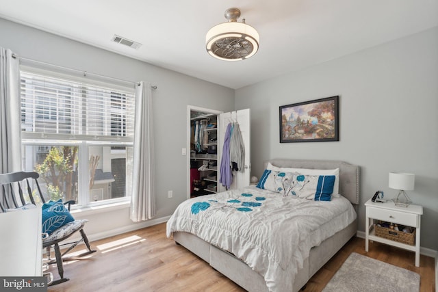 13347 Connor Dr Unit H, Centreville, VA 20120 - bedroom featuring wood finished floors, baseboards, and a spacious closet