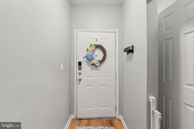 13347 Connor Dr Unit H, Centreville, VA 20120 - doorway to outside featuring light wood-type flooring and baseboards