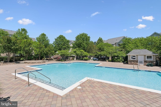 13347 Connor Dr Unit H, Centreville, VA 20120 - community pool with a patio and fence