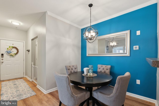 13347 Connor Dr Unit H, Centreville, VA 20120 - dining room with baseboards, wood finished floors, a chandelier, and crown molding