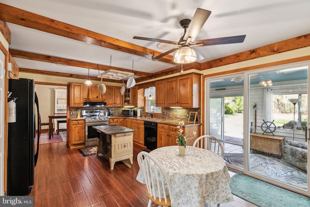kitchen featuring black appliances, brown cabinets, and backsplash