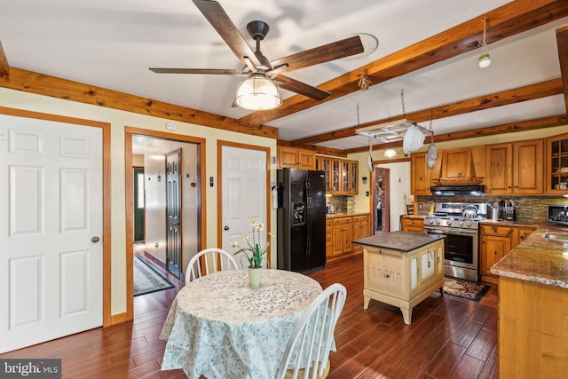 kitchen featuring tasteful backsplash, black refrigerator with ice dispenser, beam ceiling, stainless steel gas range, and dark wood-style floors