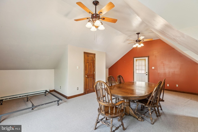 carpeted dining space with baseboards, ceiling fan, lofted ceiling, and a baseboard radiator