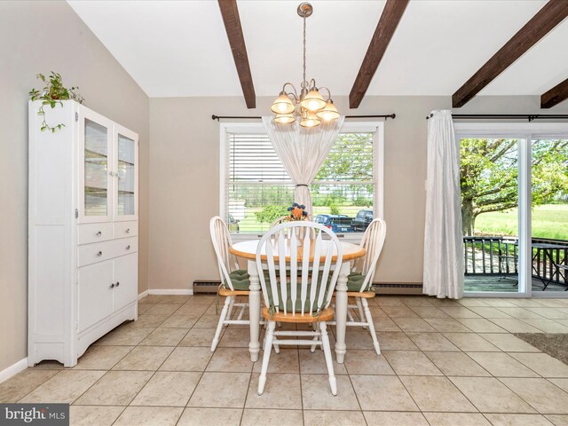 dining area featuring baseboards, a chandelier, and light tile patterned floors