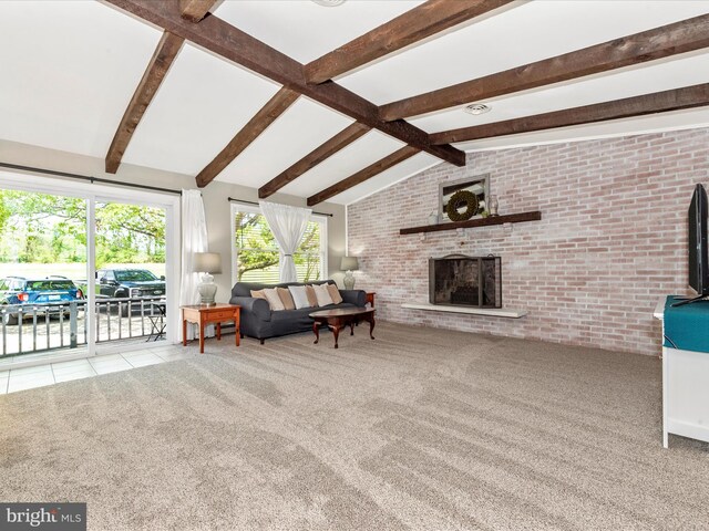 living room with a fireplace, carpet floors, lofted ceiling with beams, and brick wall