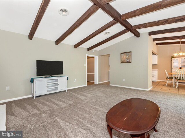 living area featuring baseboards, carpet flooring, a chandelier, and visible vents