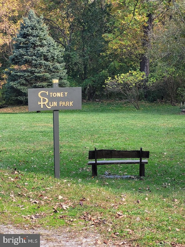 surrounding community featuring a yard