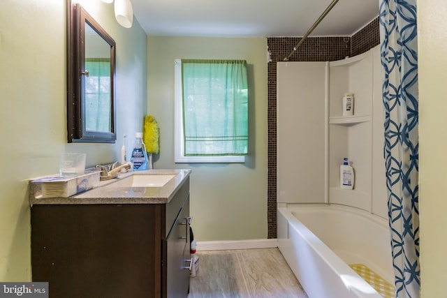 20 Coville Dr, Browns Mills, NJ 08015 - full bath with shower / bathtub combination with curtain, wood finished floors, vanity, and baseboards