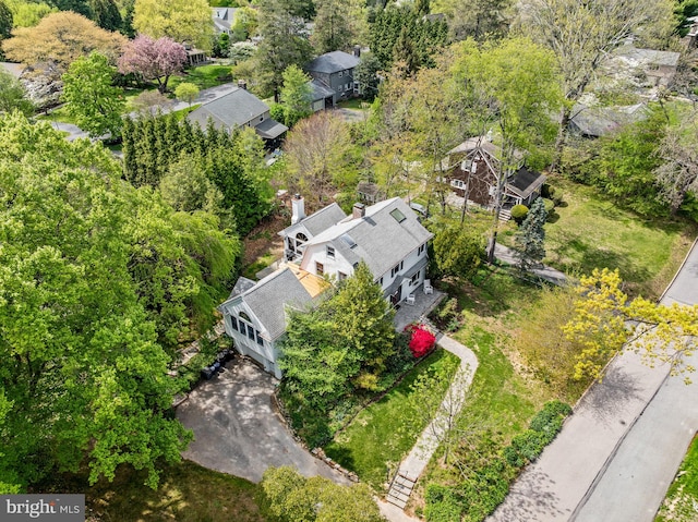 birds eye view of property with a residential view