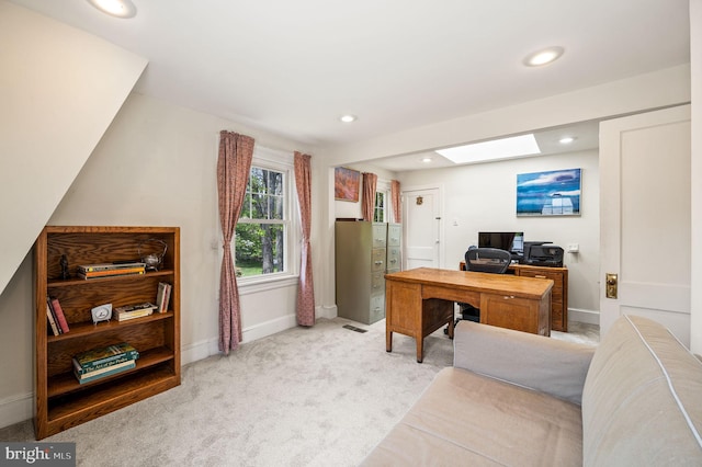 carpeted office featuring baseboards, recessed lighting, and a skylight