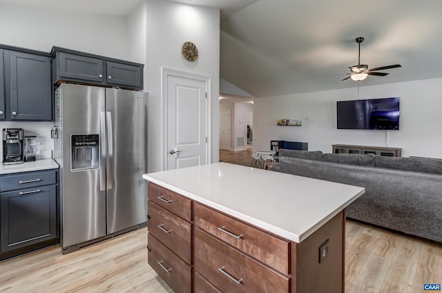 147 Langley Dr, Waynesboro, VA 22980 - kitchen with stainless steel refrigerator with ice dispenser, a ceiling fan, vaulted ceiling, and light wood-type flooring